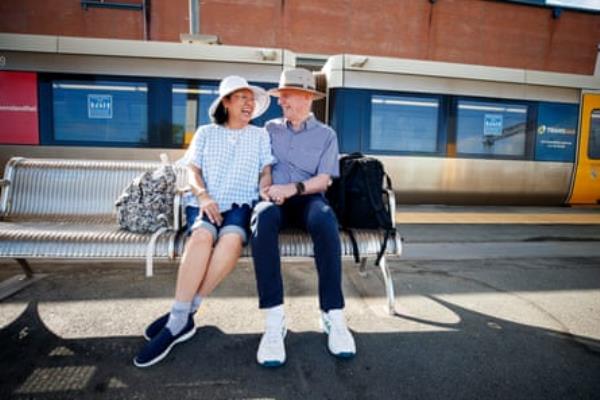 Reynolds and Ellis wait to catch their train at Nambour train station.