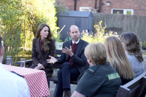 Britain’s Prince William and Kate, Princess of Wales, speak to members of the emergency services during a visit to Southport Community Centre in Southport, England, Thursday, Oct. 10, 2024. (AP)