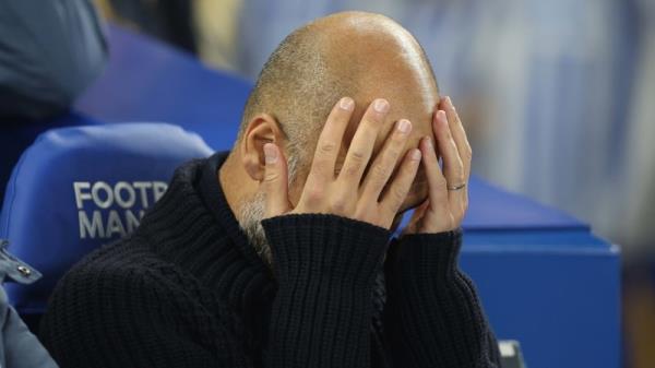 Pep Guardiola reacts during the defeat to Brighton